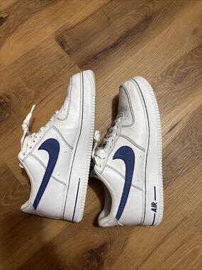 Nike White Sneakers with Navy Blue Swoosh